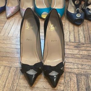 Lovely Christian louboutin black pattern heels. Sizes 38